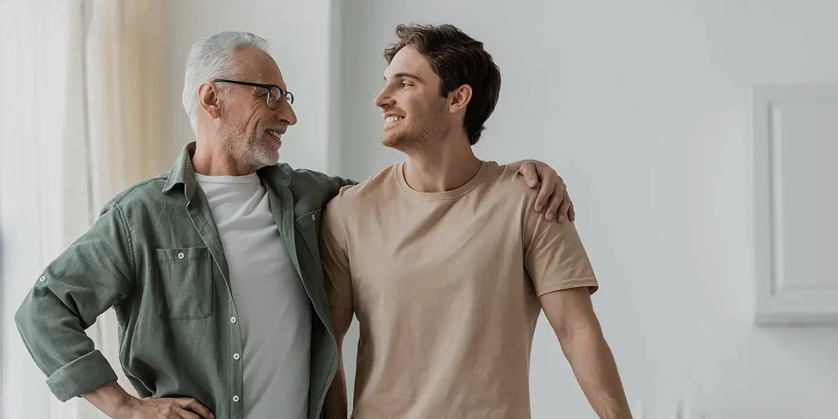 Father who may carry male pattern baldness gene with his son.