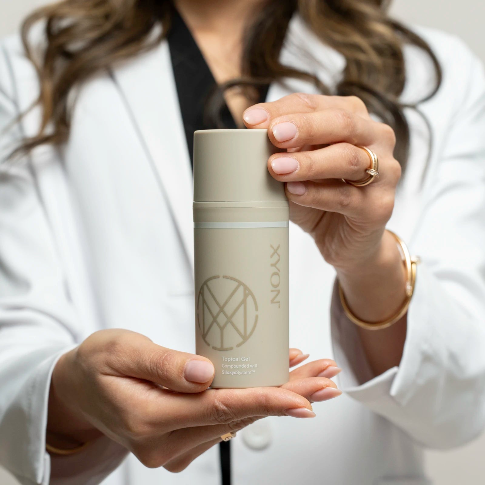 Dr Han holding XYON product