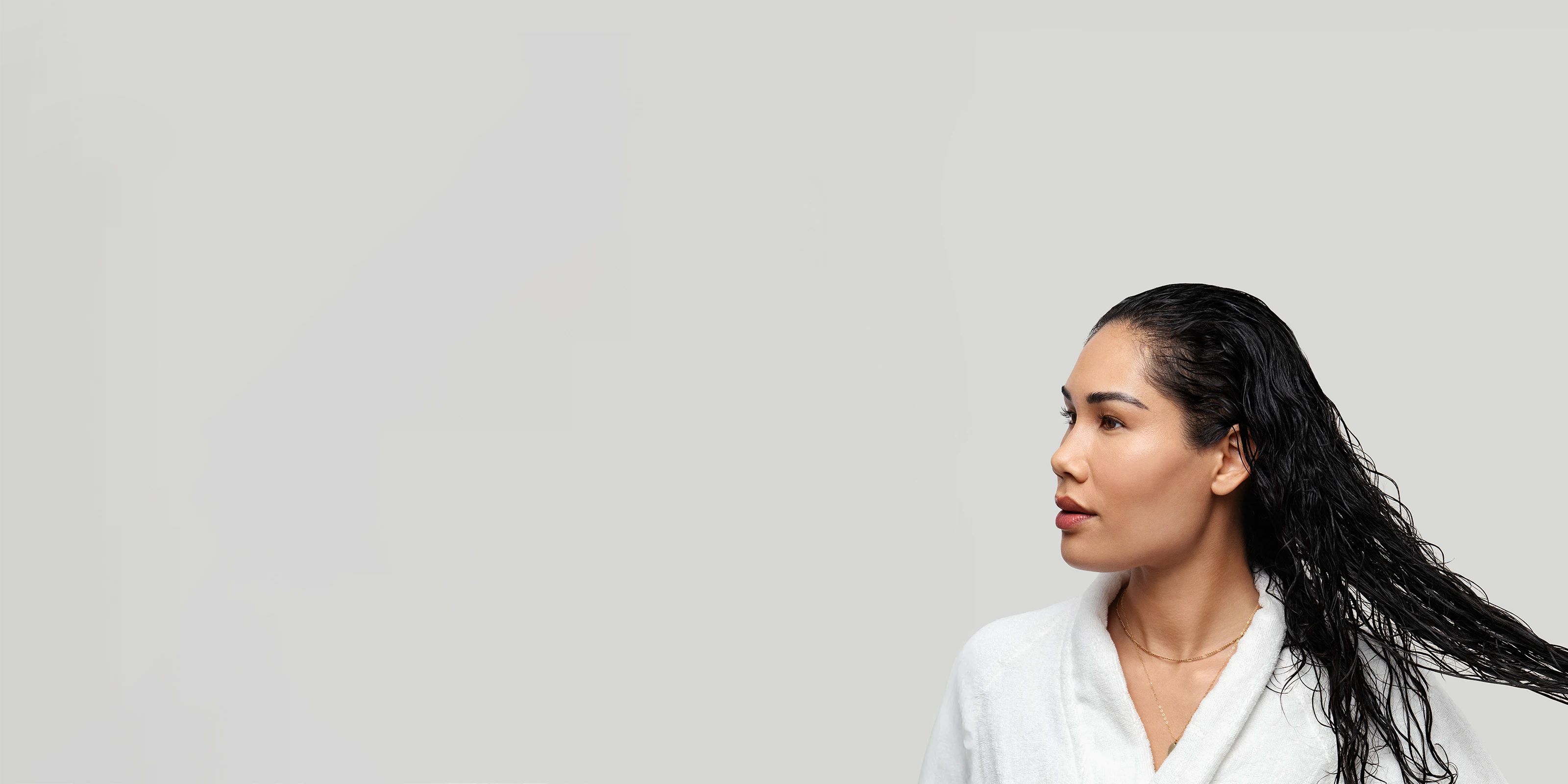 women with hair pulled back