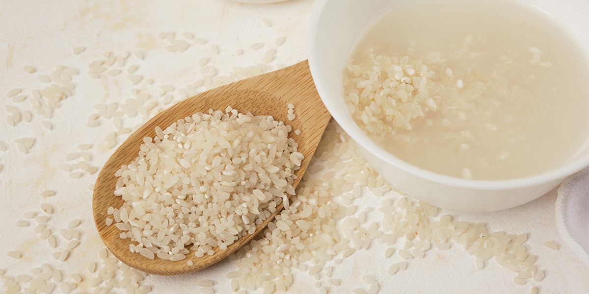 Bowl of rice water used for hair growth.