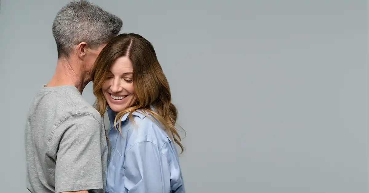 Man telling woman about Sexual Side Effects of Finasteride