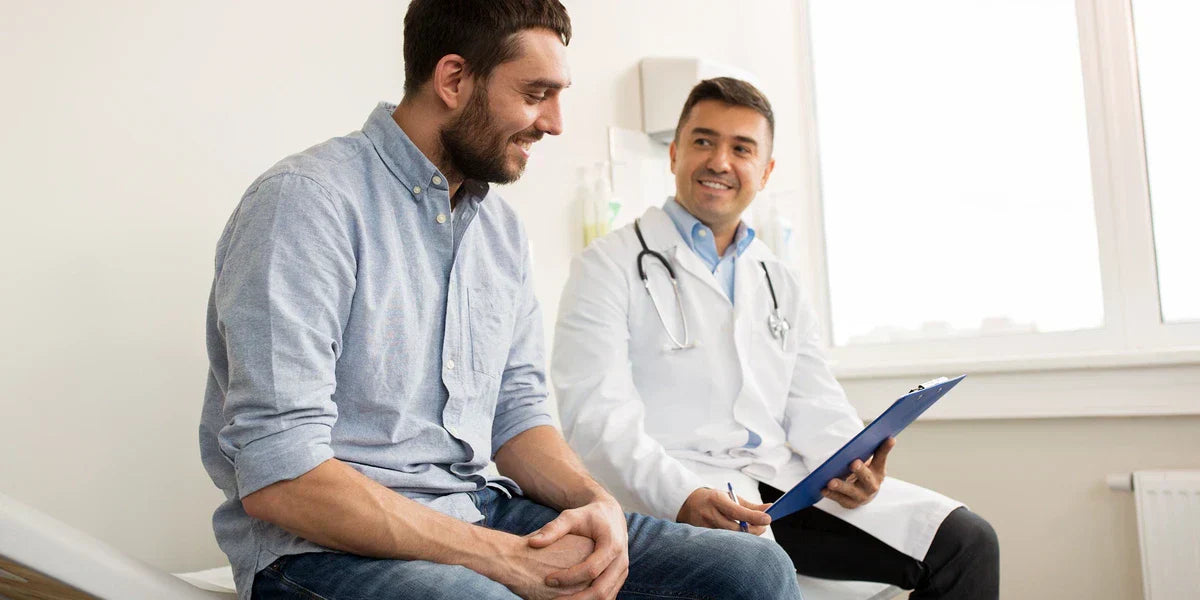 Men asking doctor about vasectomy affecting ability to get an erection  