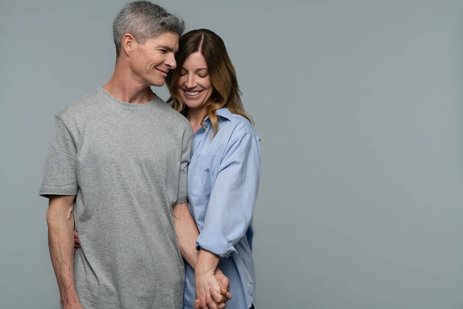 couple holding hands because he treated his erectile dysfunction 