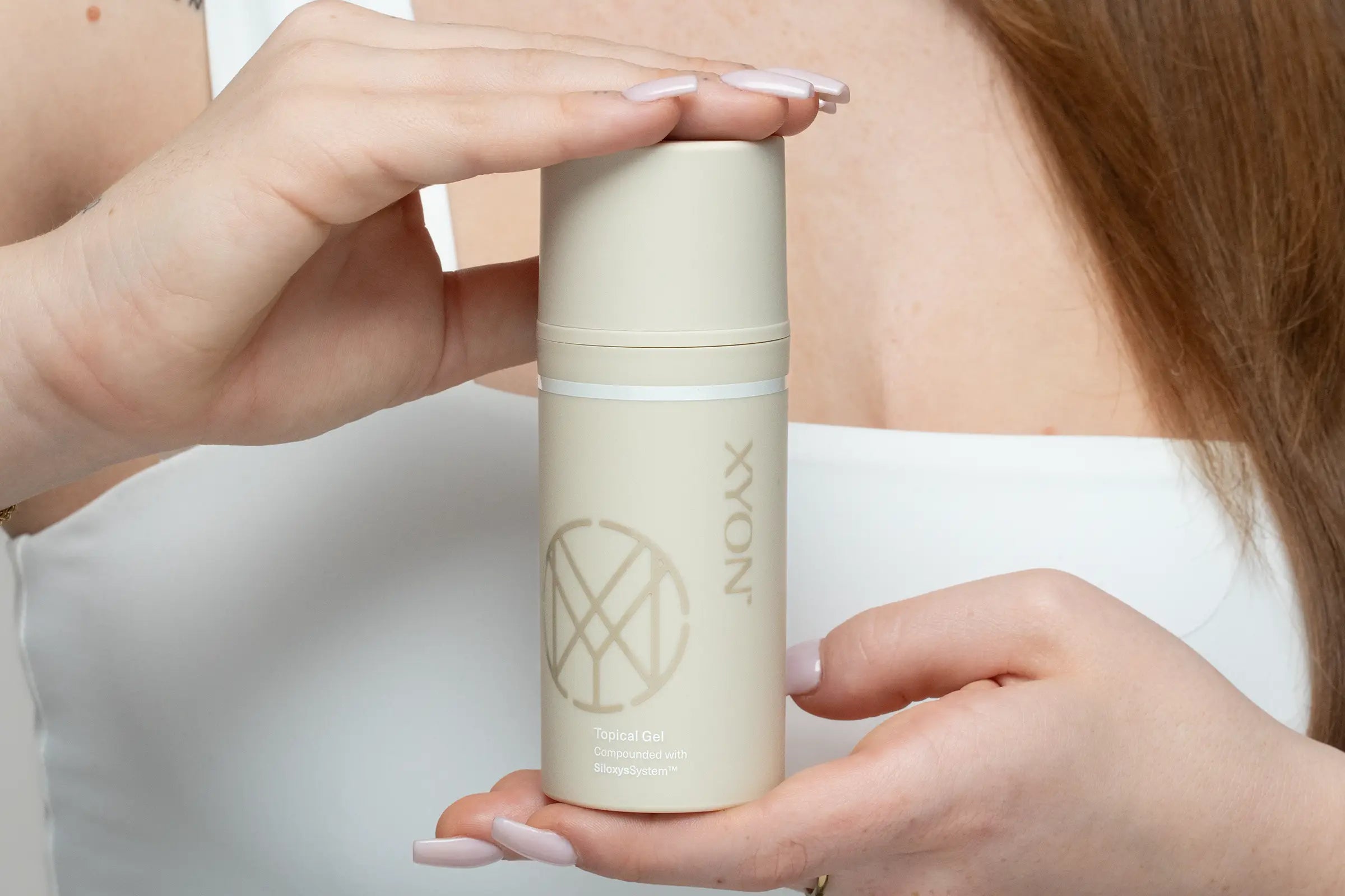 woman holding XYON product for women